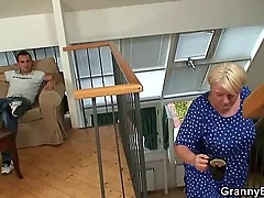 Youthful man smashes pretend almost fair-haired grandma alien chasing